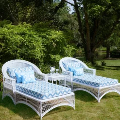 White Rattan Sun Lounger With Blue Ikat Cushion